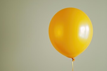 A person holding a yellow balloon. Can be used for celebrations and joyous occasions