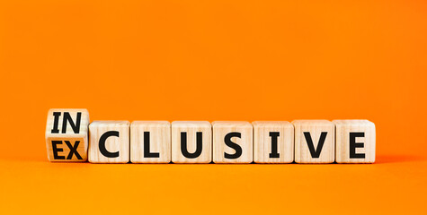 Inclusive or exclusive symbol. Concept word Exclusive and Inclusive on wooden cubes. Beautiful orange table orange background. Copy space. Business inclusive or exclusive concept.