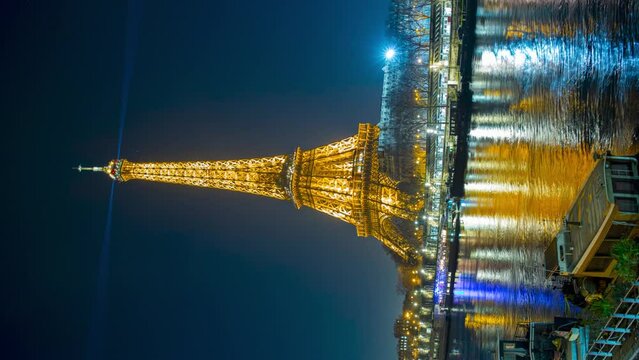 Paris, France Scenic view to the Eiffel tower and the Seine river from Bir Hakeim bridge. Vertical panoramic timelapse