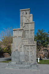 Fototapeta na wymiar Statue of Khachkars in Etchmiadzin city, one of the oldest churches in the world. Early 4th century AD. Sunny day