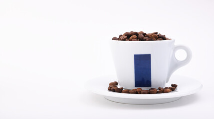 Coffee cup with coffee beans on a white background.