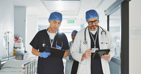 Teamwork, talking and doctors with a tablet at a hospital for health advice or surgery communication. Help, clinic and medical employees speaking with technology, planning and schedule for nursing - obrazy, fototapety, plakaty