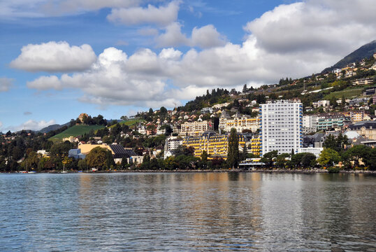 Montreux, Vaud, Switzerland, Europe - city center seen from Lake Geneva, Eurotel Montreux hotel -  white tall building, yellow Montreux Palace Hotel, left - Miles Davis Hall and Auditorium Stravinsky