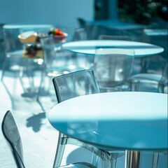 Minimalist Cafe Interior with Transparent Chairs and Blue Tables