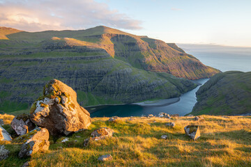 Beautiful summer scenery. Sunny summer view of fjord near Saksun , Faroe Islands. Splendid morning...