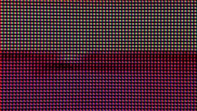 real rgb led lcd diodes displaying random glitches - macro of computer monitor or tv screen - film distortion effect overlay abstract tech background