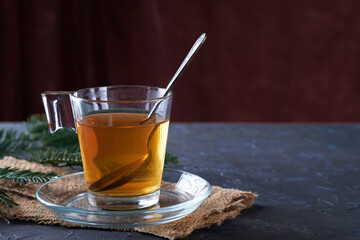 Hot fennel infusion in glass cup