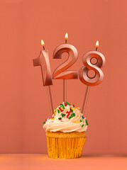 Candle number 128 - Cupcake birthday in coral fusion background