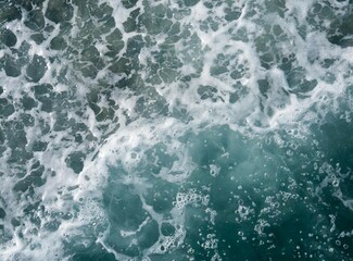 Fototapeta premium Waves with sea foam. Aerial view background/wallpaper.