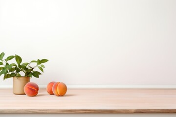 Empty wooden peach table over white wall background