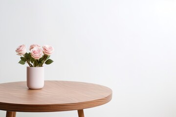 Empty wooden rose table over white wall background