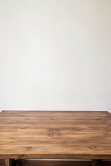 Empty wooden slate table over white wall background