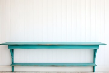 Empty wooden turquoise table over white wall background