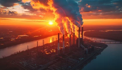 Foto auf Glas Industrial landscape, with Traditional thermal power plant generating heat, producing steam and smog at sunset. Environmental concept © IRStone
