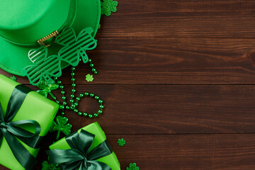 Emerald enchantment: Celebrate St. Patrick's Day with presents. Top view photo of gift boxes,...
