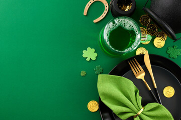 Green celebrations: Festive feasting for St. Patrick's. Top view photo of plates, cutlery, pint of...