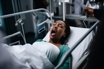 Concept Prenatal care and pregnancy. Doctor helping to a screaming woman to born