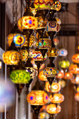 Variety of traditional vintage lanterns with an ornament lit up