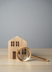 House and magnifying glass. Take a mortgage. Investments in immovable assets. Property Inspection...