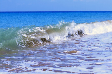 Sea waves. Seascape. Turbulent the sea. Vacation and summer concept. Powerful Ocean blue waves with white foam. Sea wave. Tourism. Travel. Marine nature. Large turquoise sea wave. Beautiful foam waves