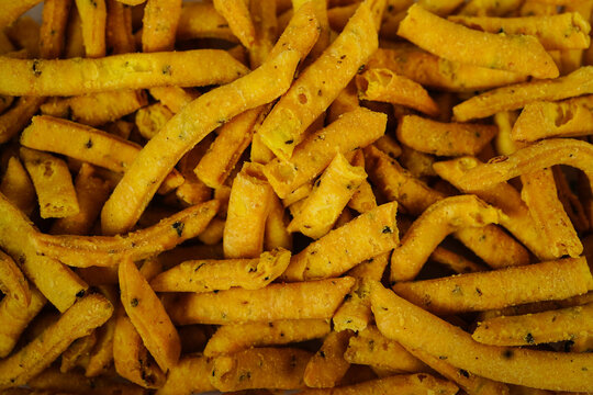 Methi Para - Indian savory snacks with fenugreek leaves and chickpea flour, selective focus