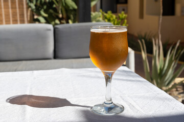 Lunch with cold beer in Spanish outdoor cafe