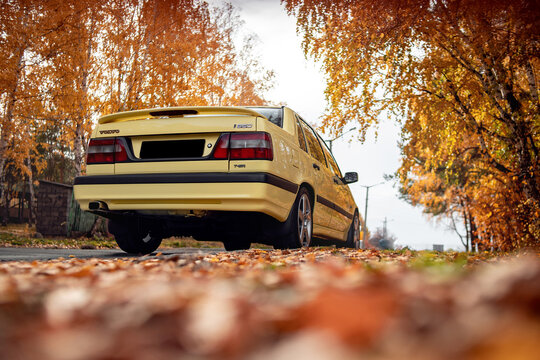 old car in autumn forest Volvo 850 T-5R Yellow