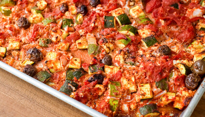 Healthy fresh meal, baked vegetables. Homemade delicious lunch with, potatoes, tomatoes, zucchini for restaurant, menu, advert or package, close up selective focus