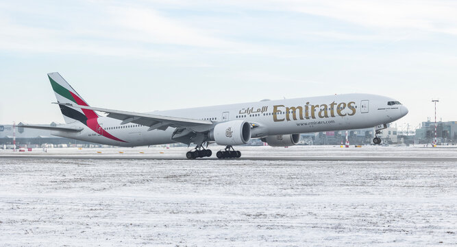 PRAGUE - January 21, 2024: Emirates Boeing 777-31H(ER) REG: A6-ENX at Vaclav Havel Airport Prague. From Dubai to Prague.Emirates is the largest airline and one of two flag carriers of the UAE.