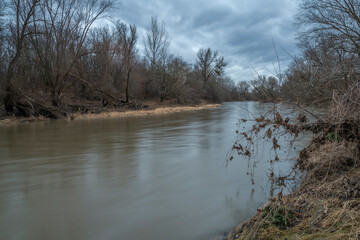 Becva river near Prerov town in cloudy cold winter morning