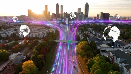 Fiber optic streams over highway showing global internet connectivity in USA city during sunset. 3D graphic over Atlanta cityscape. Aerial
