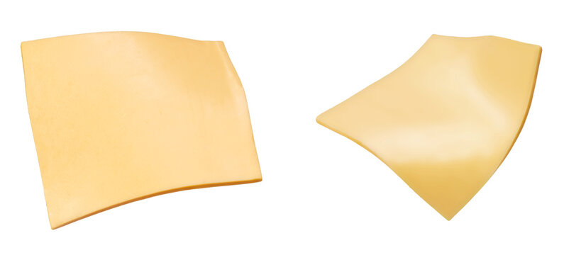 Square slices of processed cheese isolated on white background
