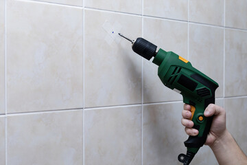 drilling tiles with a drill with a spear drill