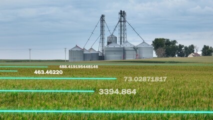 Smart farming technology on Agricultural silos and farmland with digital data metrics. Aerial view of cornfield and corn bins. 3D render © TechAnimationStock