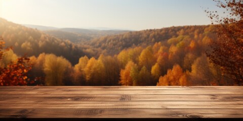 Empty wooden table set against a picturesque autumn backdrop, ideal for showcasing products.