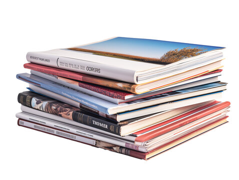 a stack of magazines on a white background
