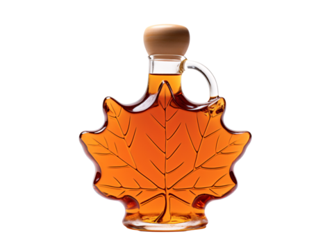 a glass bottle of liquid and a leaf