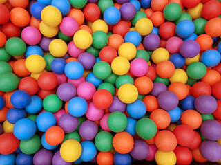 Fototapeta na wymiar Many color plastic balls background.