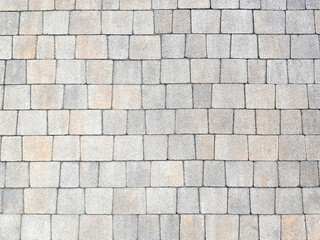 Stone pavement tiles texture background.