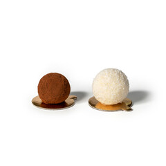 Chocolate truffle and coconut truffle balls isolated on white background. Candy bar, sweets and dessert