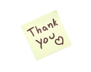 Sticky note with text THANK YOU and heart on white background