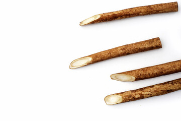 Burdock Root (Gobo) on white background.