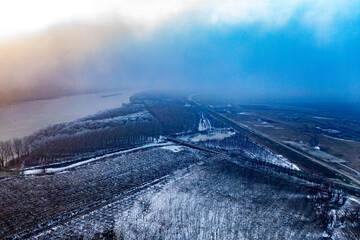 Fogbound Winter Wonderland: Aerial Panorama of Colored Hues