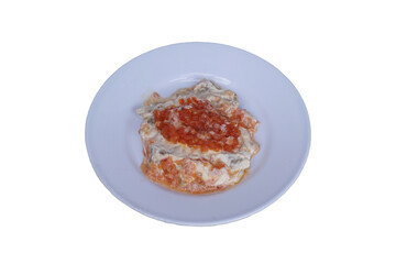 Kopoglu is a typical eggplant appetizer and can be consumed as a spread, condiment or salad. Traditional Turkish appetizer, isolated on white background.