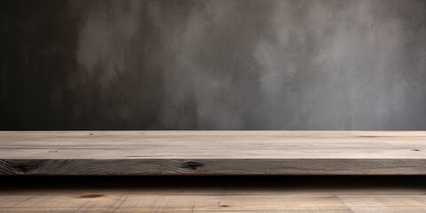 Wooden table with concrete background for displaying products.
