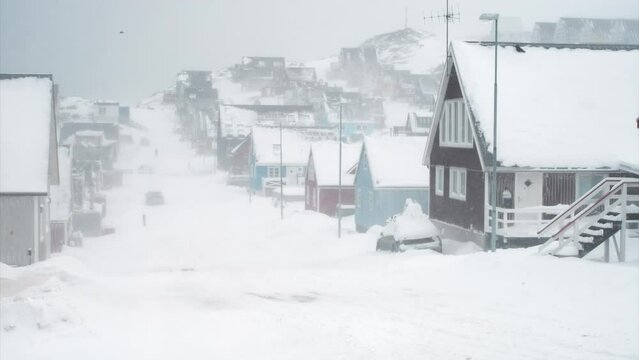 Heavy snow storm during winter, blizzard, inside a city in Greenland's Capital, Nuuk.