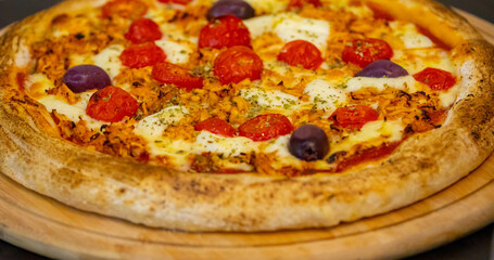 Traditional Brazilian chicken pizza with catupiry cheese, long-aged dough baked on a stone