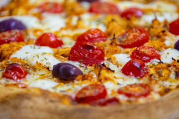 Traditional Brazilian chicken pizza with catupiry cheese, long-aged dough baked on a stone