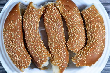 Simit, rosquilla, a circular bread, typically encrusted with sesame seeds or, less commonly, poppy,...