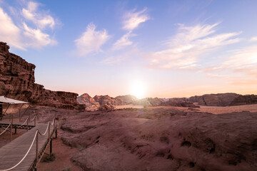 Scenic view of Arabic / Middle Eastern sandstone and desert landscape against sky during sunset....